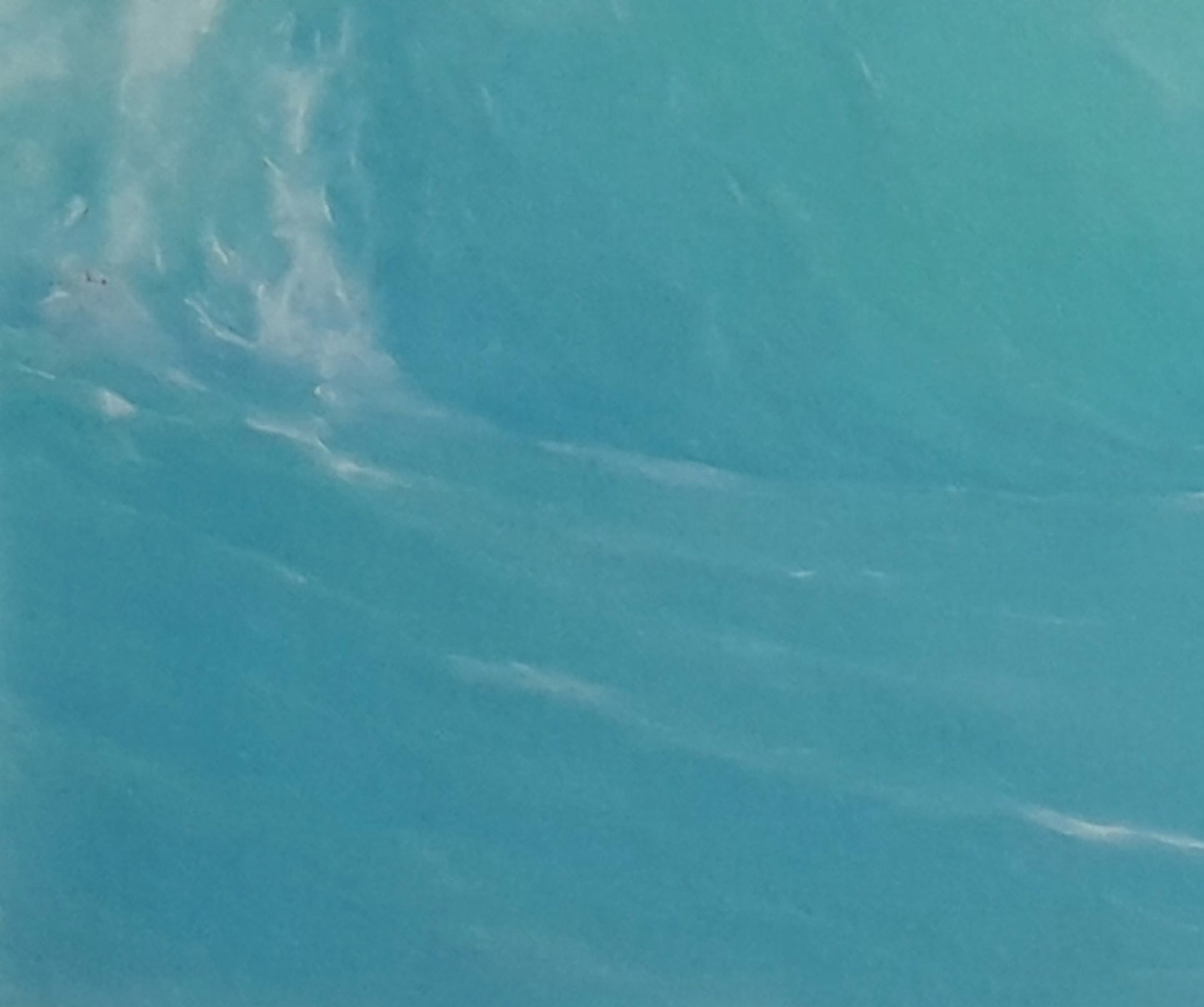 Vast turquoise ocean wave with frothy crests in Vasily Korkishko oil painting