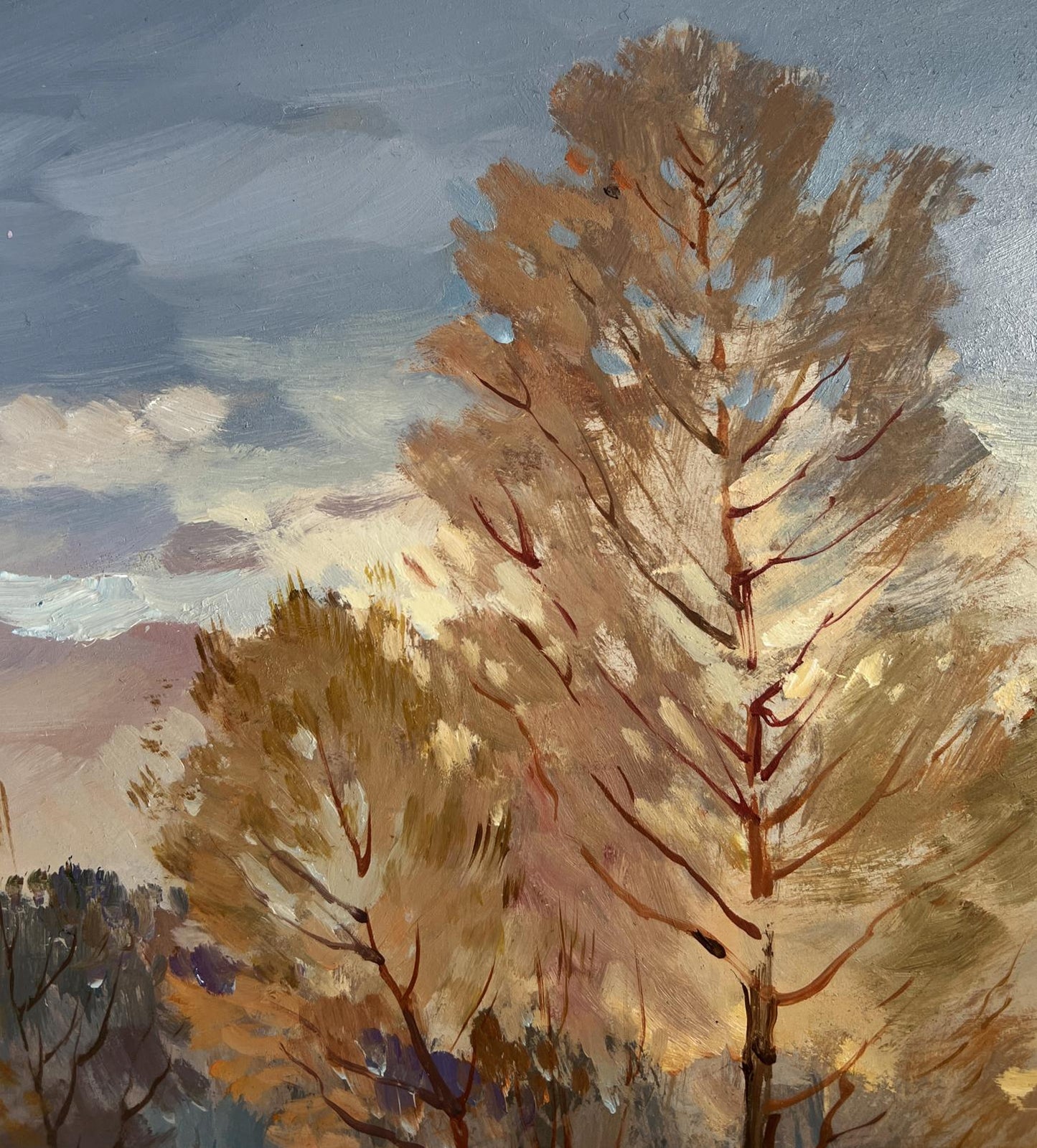 Oil painting of tall trees in golden foliage, snow and sunset lights by Yuriy Suprunchuk