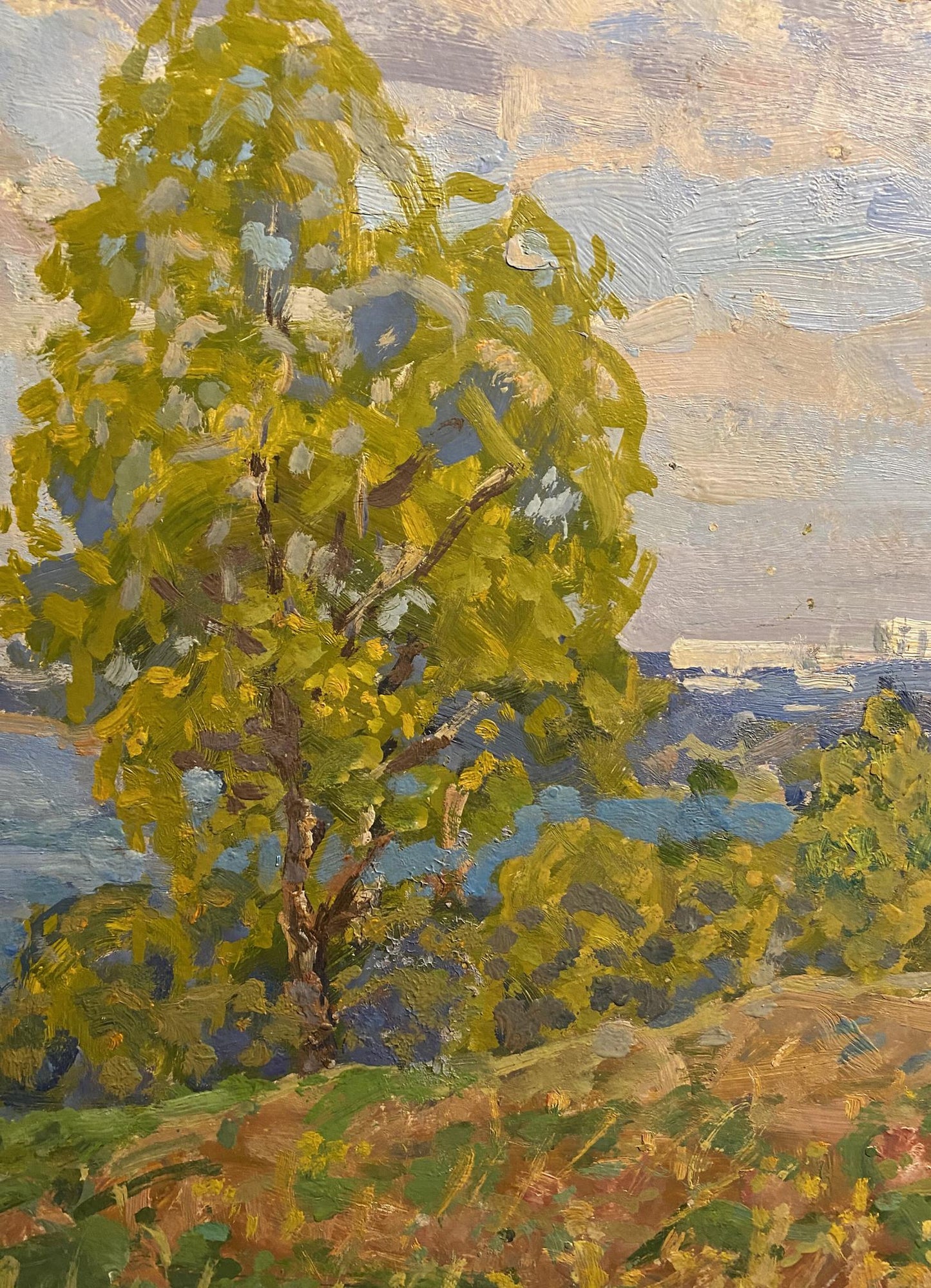 Vibrant yellow-green tree in impressionistic oil painting Oil painting City in the distance Georgy Kolosovsky