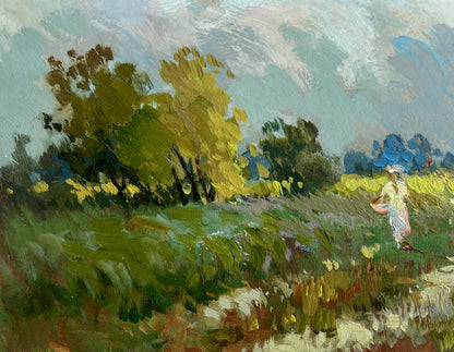 Oil painting by Yuriy Suprunchuk: girl walking in vibrant green field