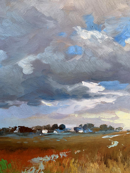 Oil painting Not far from the village by Yuriy Suprunchuk with dramatic sky