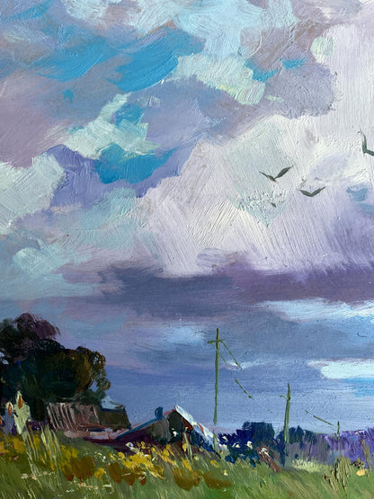 Impressionistic oil painting by Yuriy Suprunchuk of swirling blue-purple clouds over village field