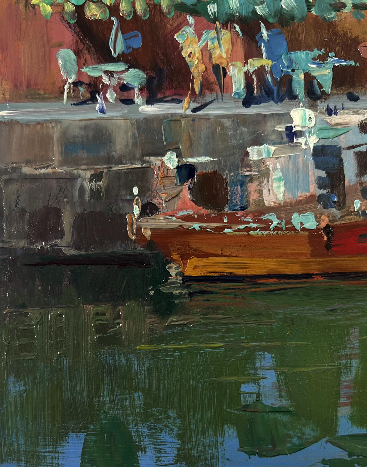 Vibrant orange boat on stone quay in Yuriy Suprunchuk oil painting City with boats