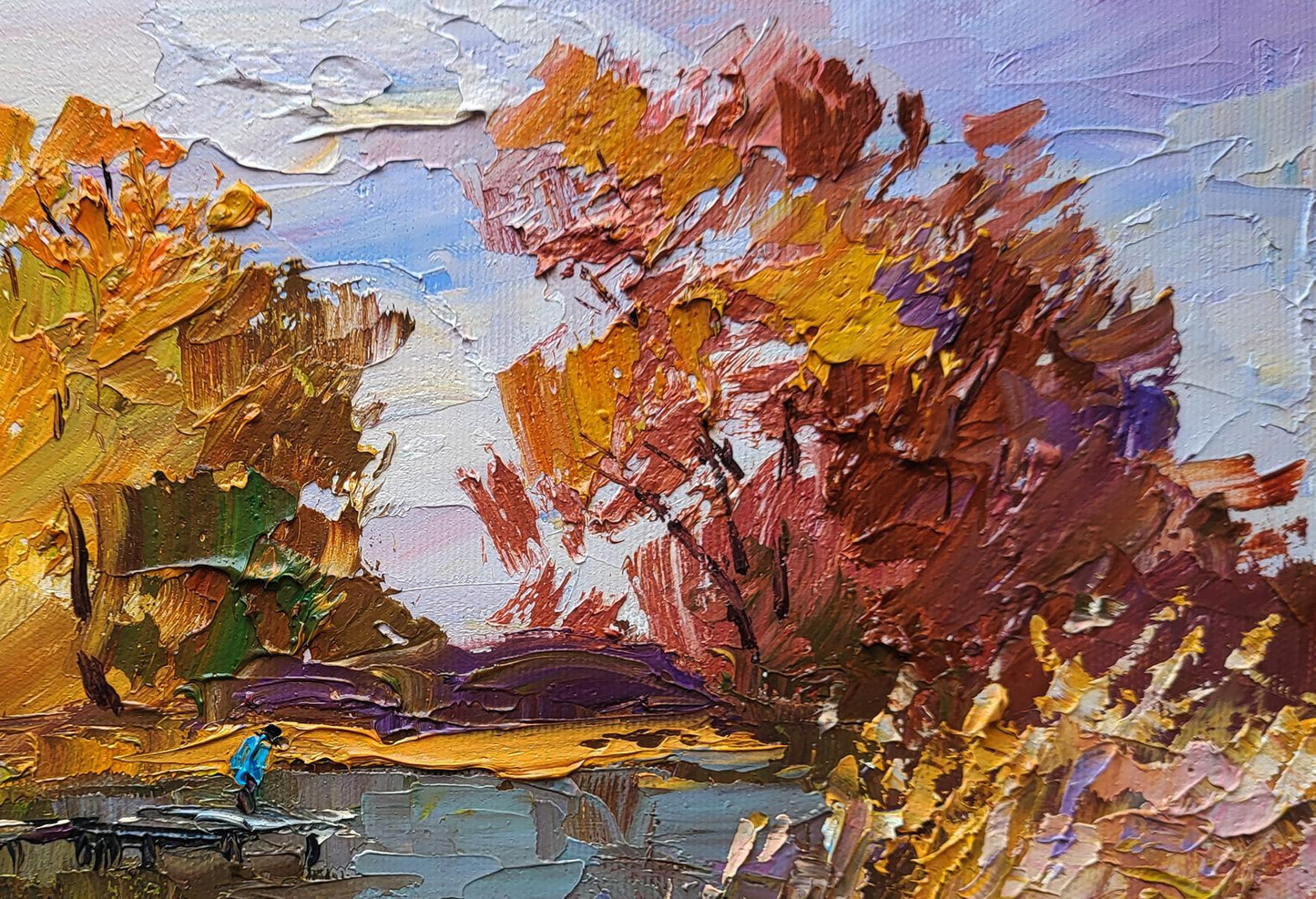 Oil painting On the Autumn River by Boris Serdyuk: vibrant fiery trees