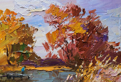Oil painting On the Autumn River by Boris Serdyuk: vibrant fiery trees