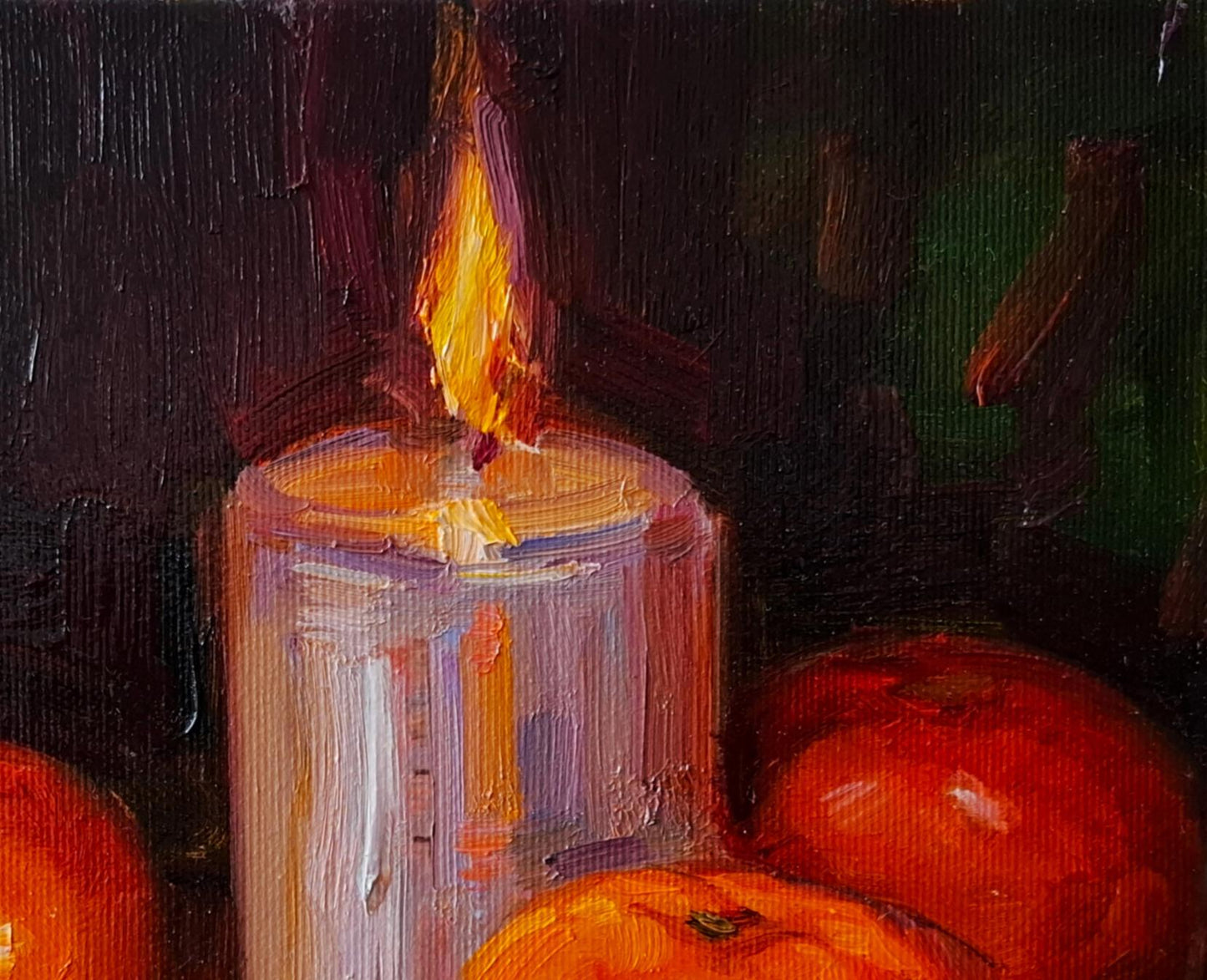 Oil painting of mandarins and lit candle by Vyacheslav Pereta