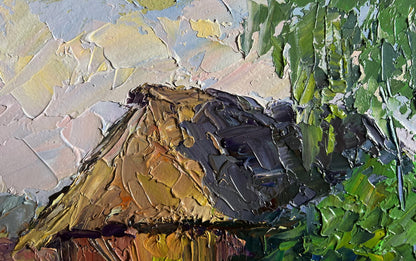 Textured impasto oil painting of dark bird in green foliage by Boris Serdyuk