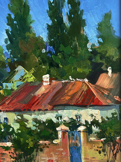 Oil painting of vibrant red tiled roof on whitewashed house by Yuriy Suprunchuk