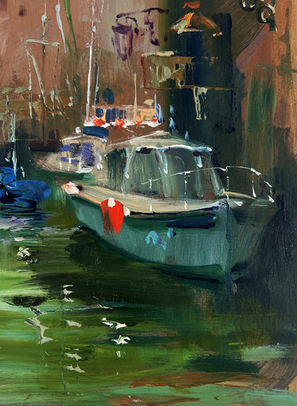 Teal-green boat with red patch docked in calm water by Yuriy Suprunchuk