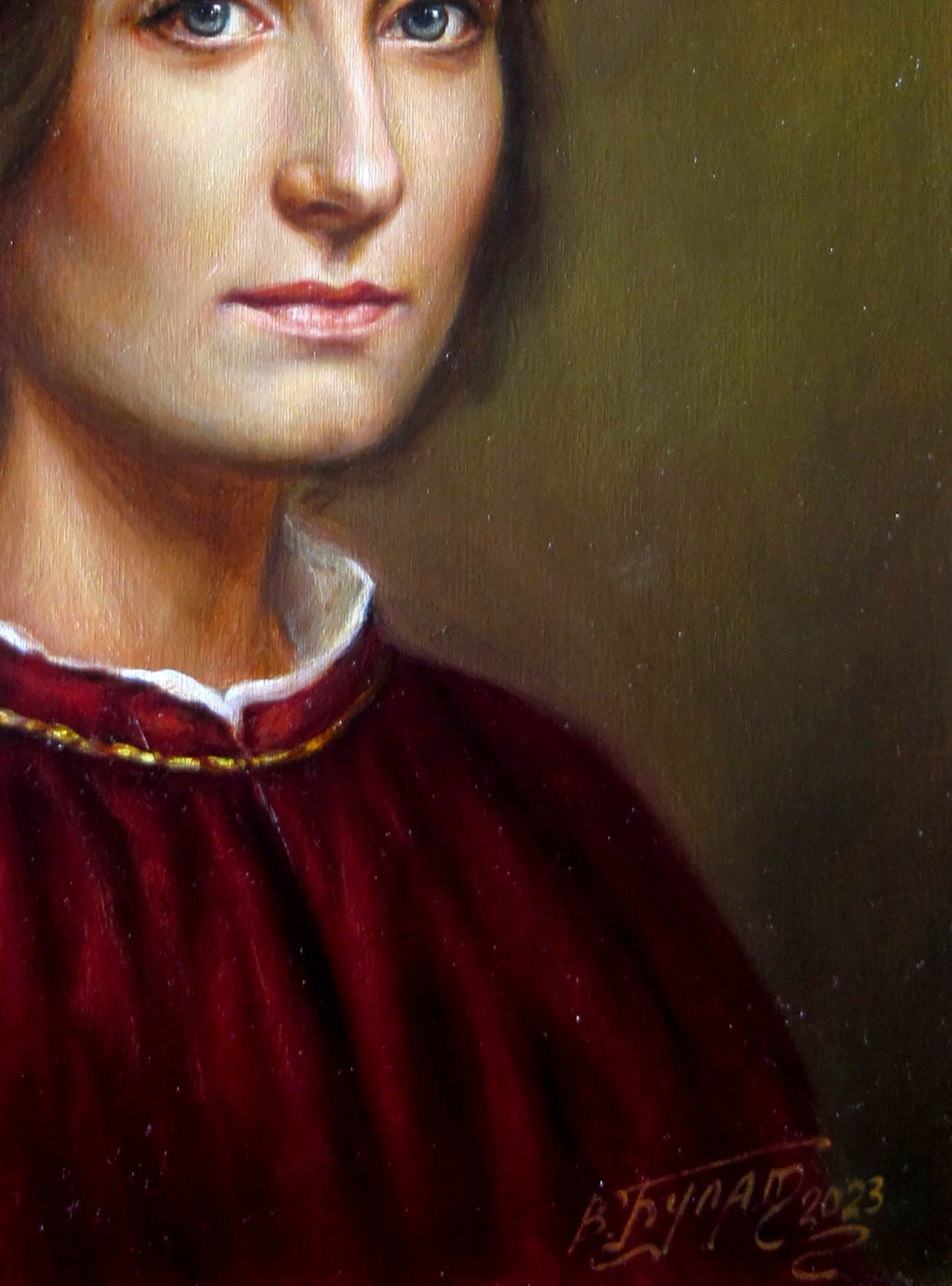 Oil painting portrait by Valeriy Bulat: smiling woman in red velvet with blue eyes