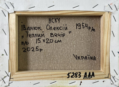 Back of Oleksiy Ivanyuk Oil painting Light at day’s end, beige canvas with black text, light wood frame