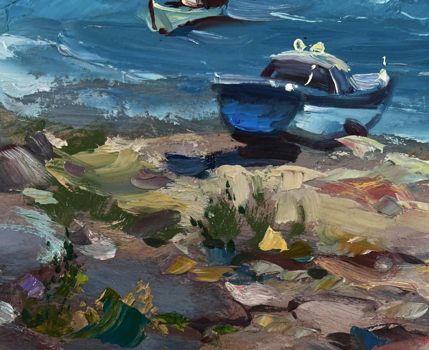 Oil painting of blue white fishing boat on rocky shore by Yuriy Suprunchuk