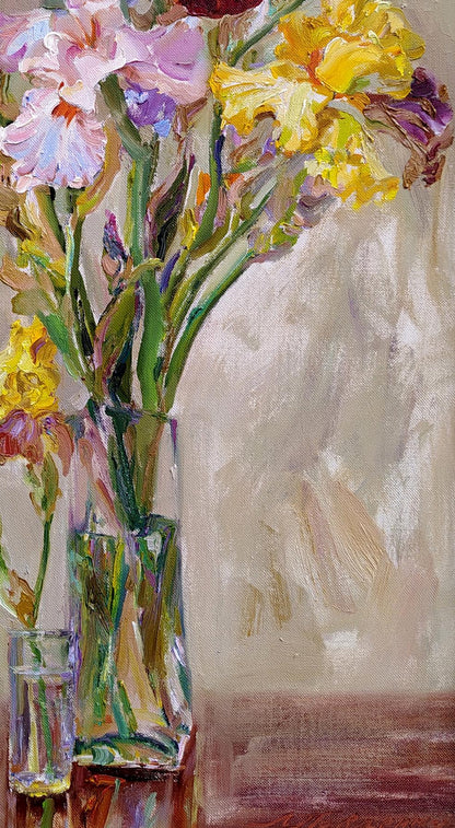 Oil painting of vibrant irises in glass vase by Leonid Pavlenko