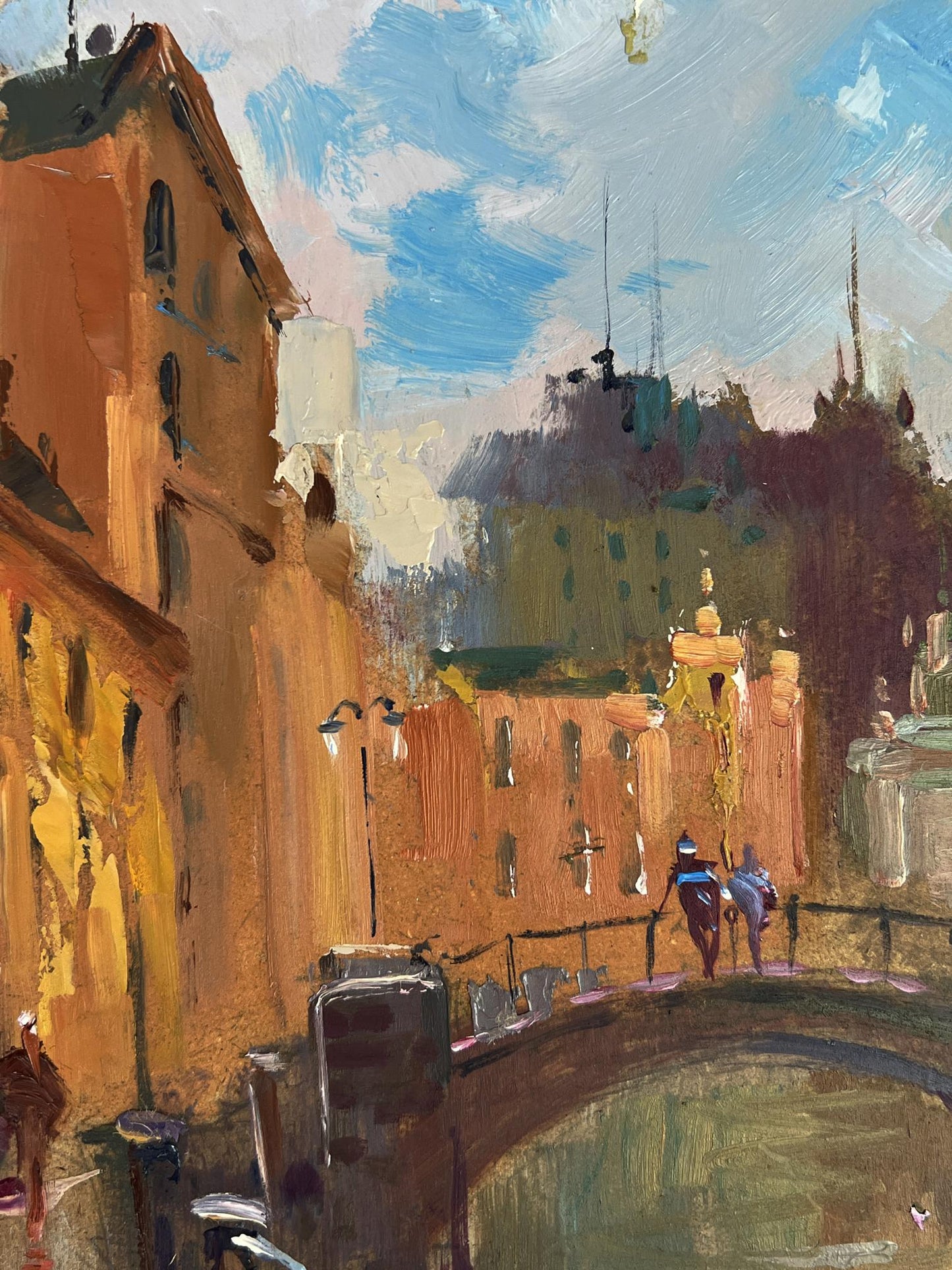 Warm-toned oil painting by Yuriy Suprunchuk of city streets with bridge