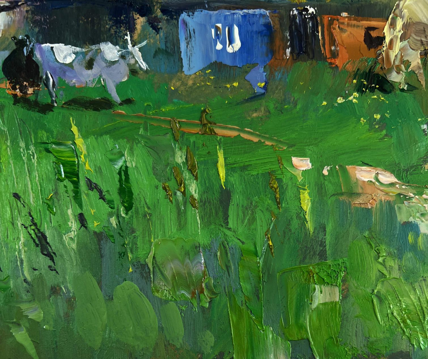 Oil painting of vibrant green field with huts, cattle by Yuriy Suprunchuk