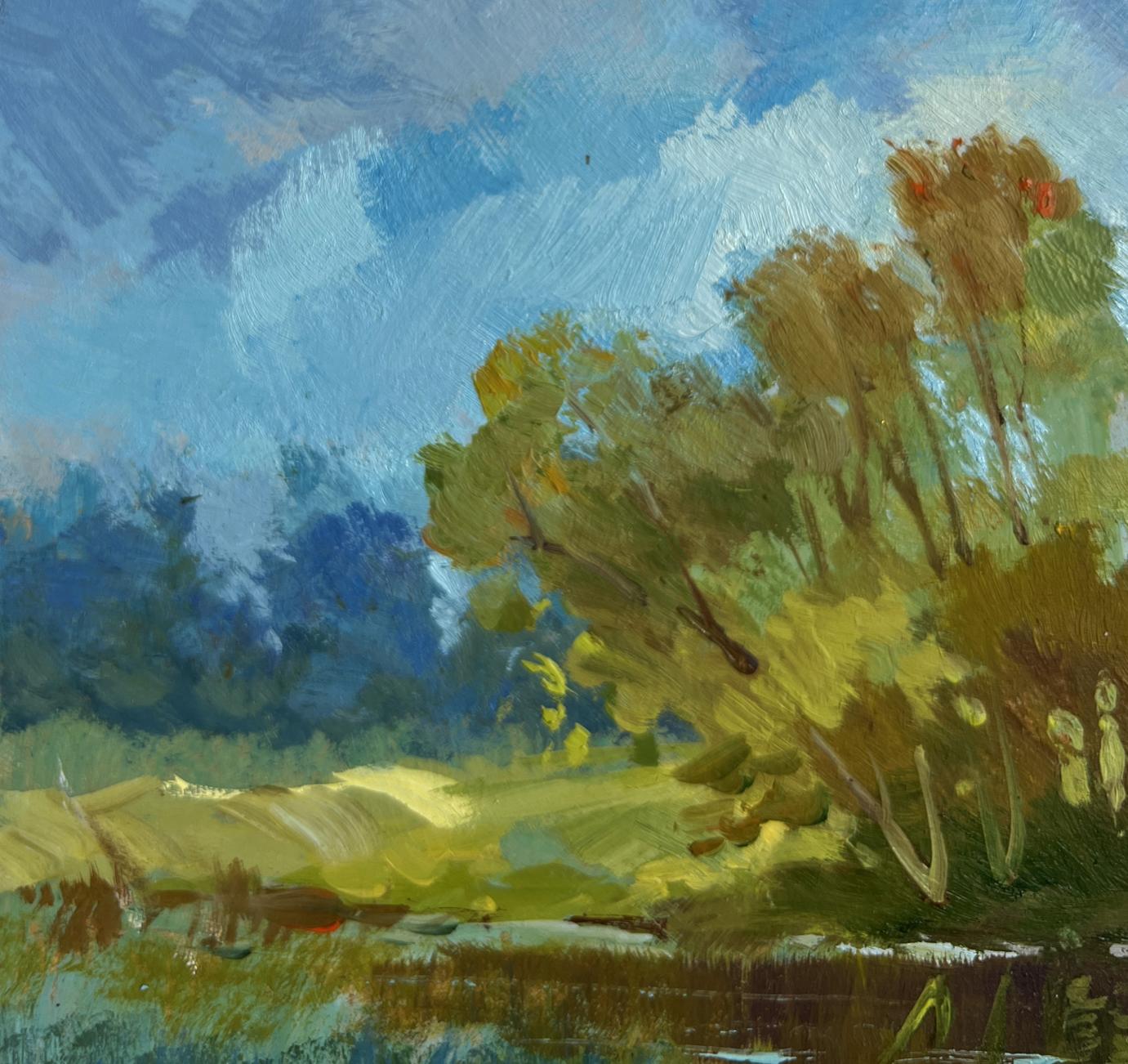 Vibrant impressionist oil painting by Yuriy Suprunchuk of sunlit golden trees