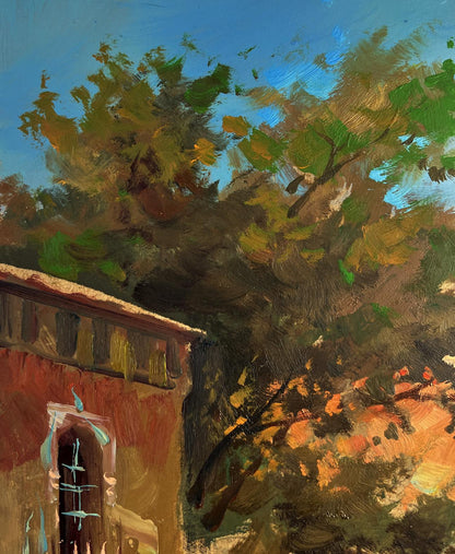 Oil painting of Yuriy Suprunchuk water channels by city walls, autumn trees