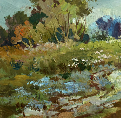 Impasto oil painting of sunlit summer meadow by Yuriy Suprunchuk