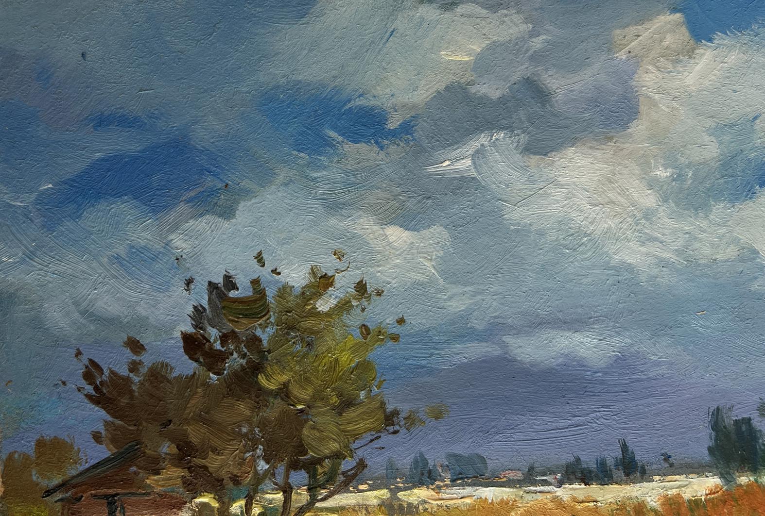 Oil painting by Yuriy Suprunchuk: autumn tree, sun through blue clouds