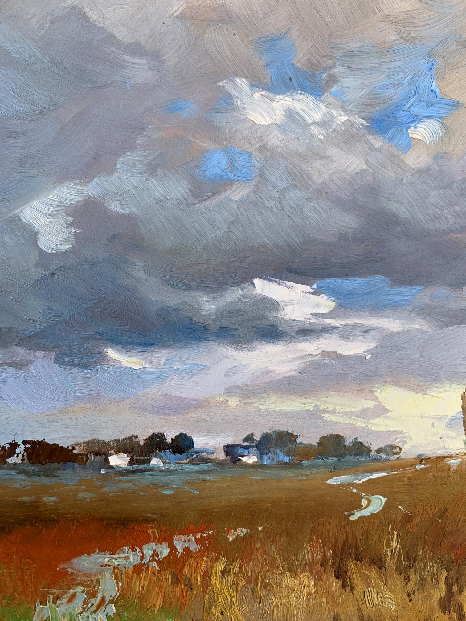Oil painting Not far from the village by Yuriy Suprunchuk: dramatic sky over golden field