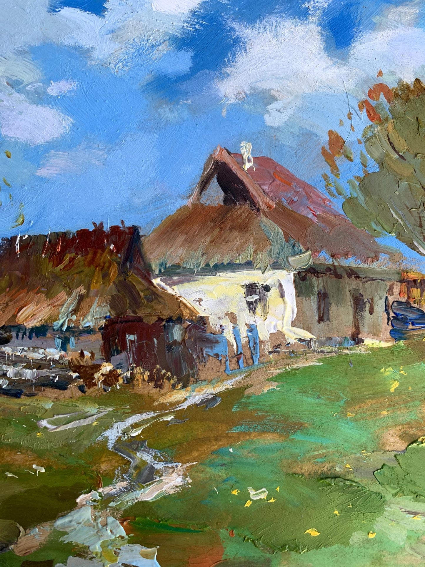 Oil painting of rustic thatched-roof village house by Yuriy Suprunchuk