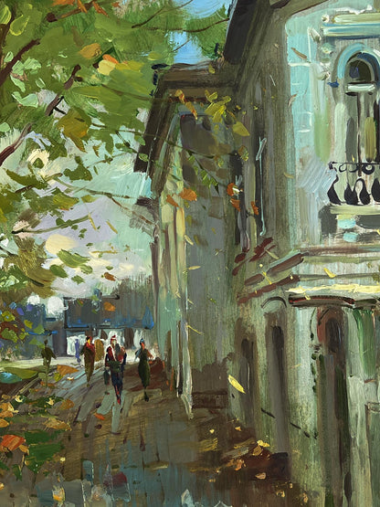 Oil painting by Yuriy Suprunchuk: daytime city street with falling green yellow leaves