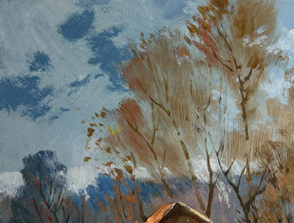 Autumn oil painting by Yuriy Suprunchuk: bare trees and warm leaves on blue sky