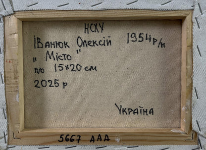 Back of Oleksiy Ivanyuk oil painting City in the rays of sunset with Cyrillic text