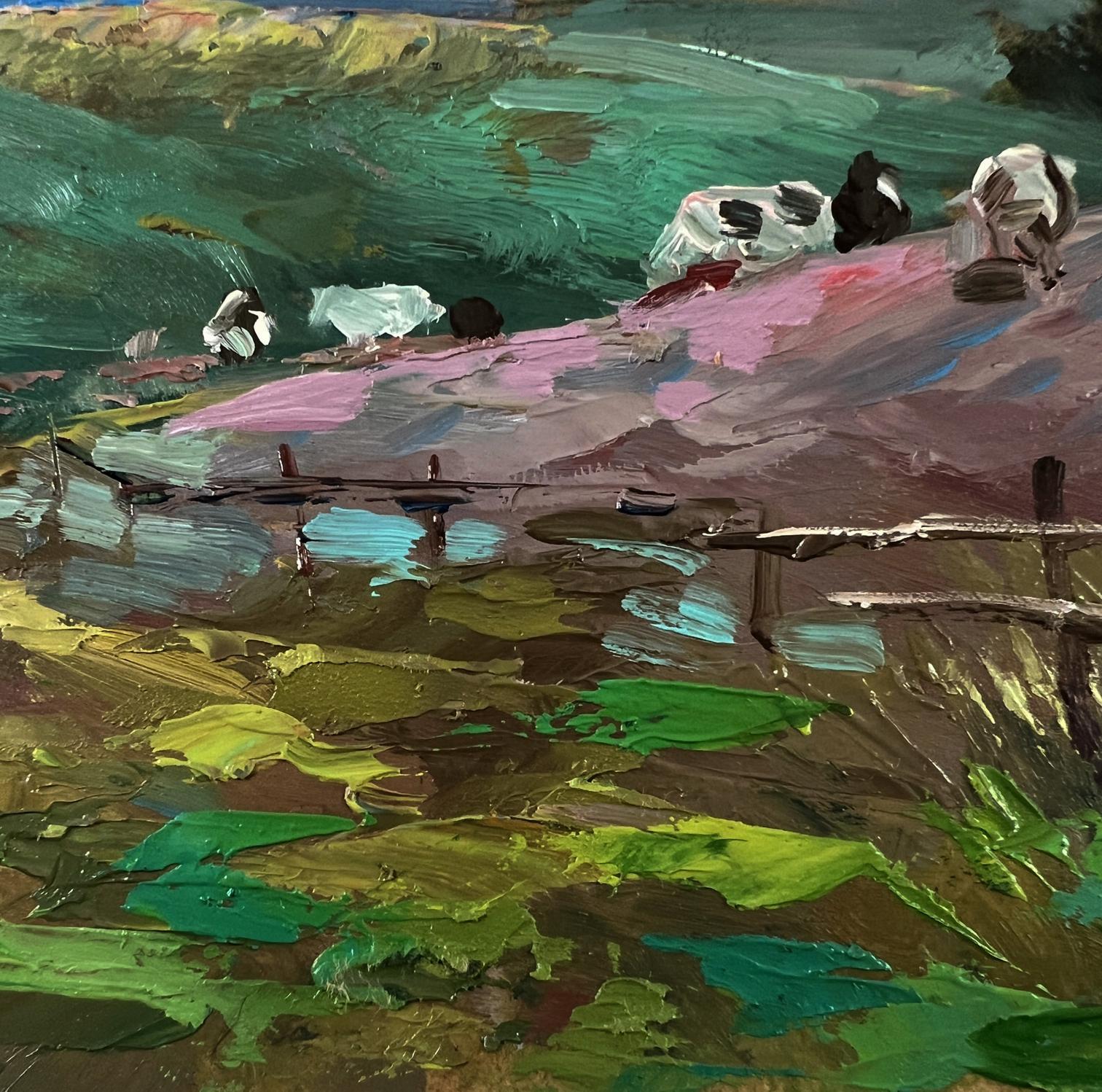 Vibrant impressionist oil painting by Yuriy Suprunchuk of quiet village cows on pink hills