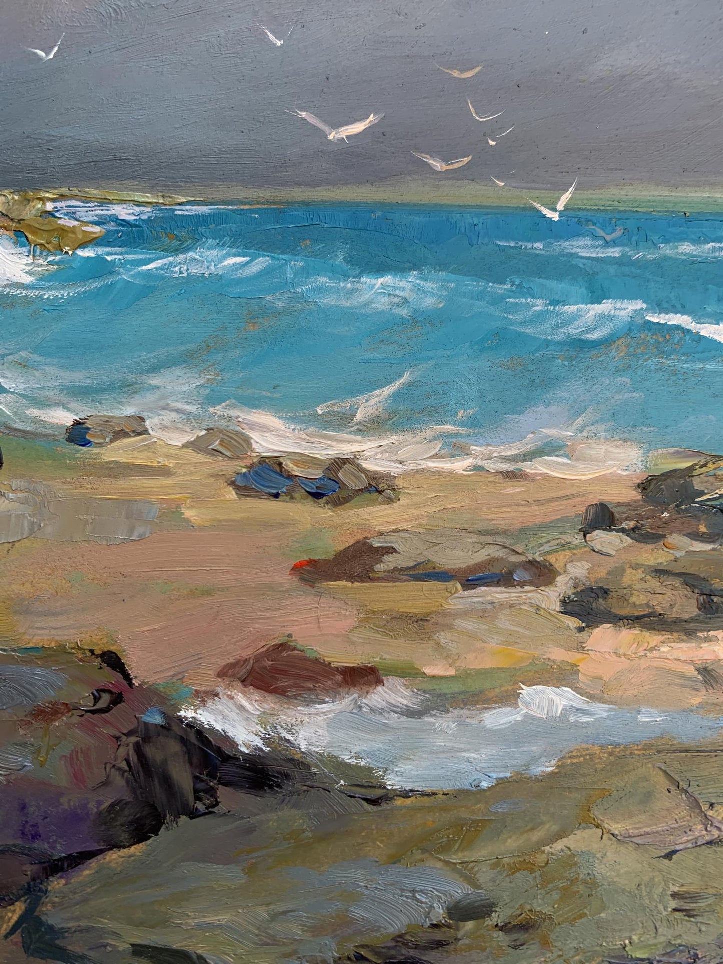 Oil painting of white seagulls on turquoise waves crashing against rocky seashore by Yuriy Suprunchuk