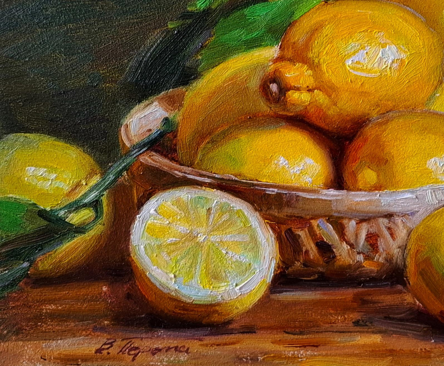 Oil painting Still life with lemons by Vyacheslav Pereta: halved yellow lemon