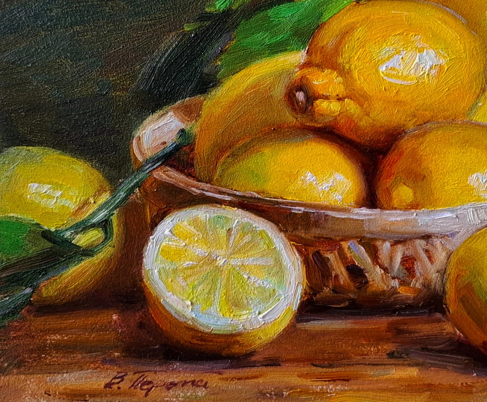 Oil painting Still life with lemons by Vyacheslav Pereta: halved yellow lemon