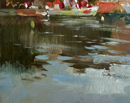 Oil painting of sunset glow over rooftops by Yuriy Suprunchuk