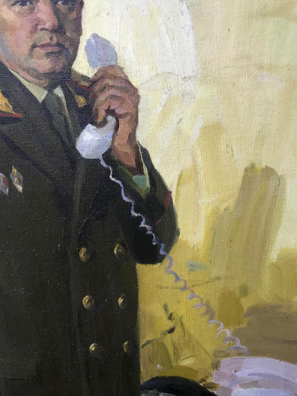 Hand holding white vintage telephone receiver, KGB Major General Soroka portrait