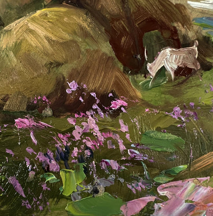 Oil painting by Yuriy Suprunchuk: pink purple flowers, village in clouds