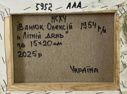 Framed beige textile with black embroidered text by Oleksiy Ivanyuk