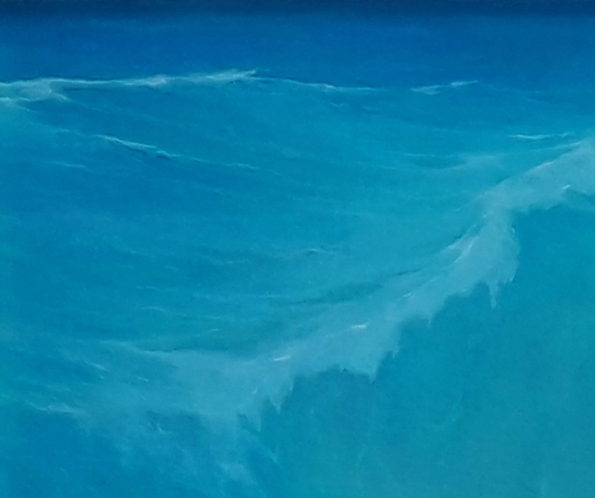Vibrant turquoise ocean waves with frothy crests rolling toward sun by Vasily Korkishko