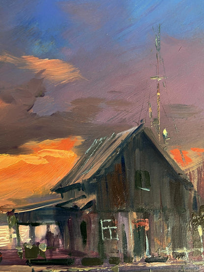 Oil painting of rustic wooden house by Yuriy Suprunchuk under dramatic sky