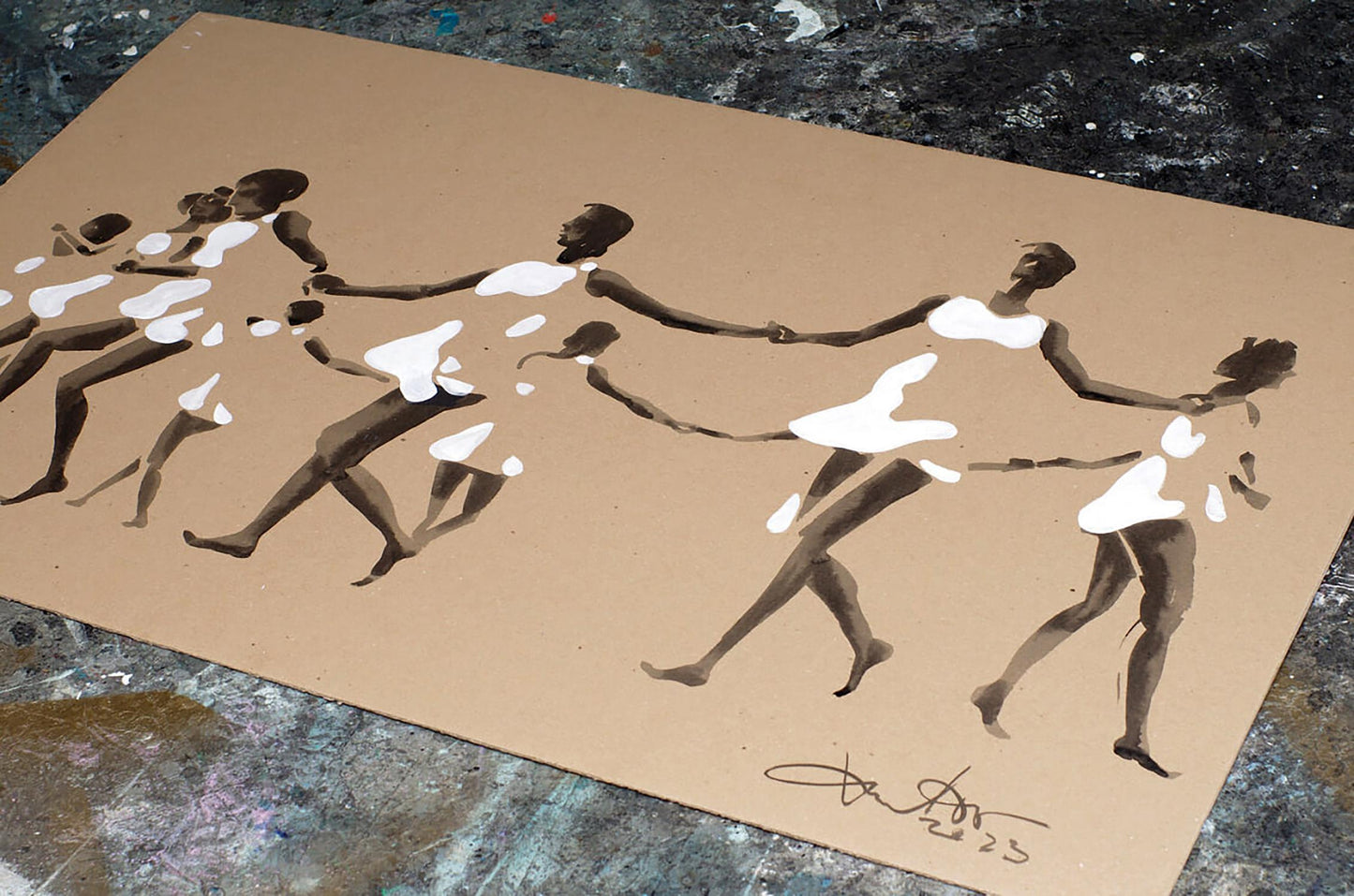 Brown paper dancer silhouettes artwork by Dima Filatov, white splatters