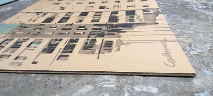Back of watercolor painting Mom Dima Filatov: beige cardboard map with streets