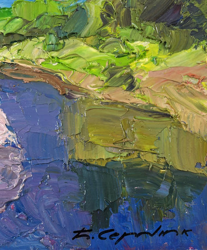 Vibrant impressionist oil painting of sand underfoot with green hills and blue water by Boris Serdyuk