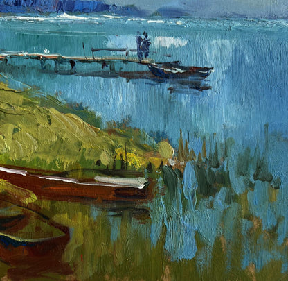 Oil painting of house near river by Yuriy Suprunchuk, serene lakeside scene