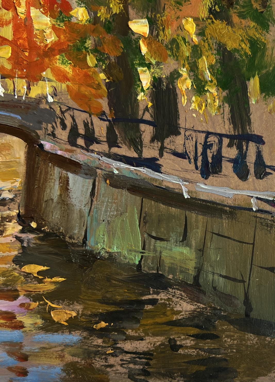 Oil painting of autumn city park with orange tree over stone bridge by Yuriy Suprunchuk