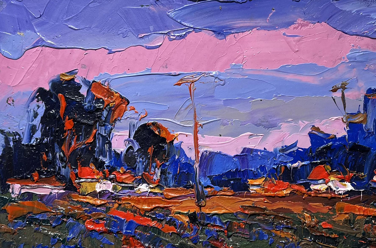 Oil painting of pink sunset by Oksana Ivanyuk with bold pink, blue, orange strokes
