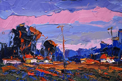 Oil painting of pink sunset by Oksana Ivanyuk with bold pink, blue, orange strokes