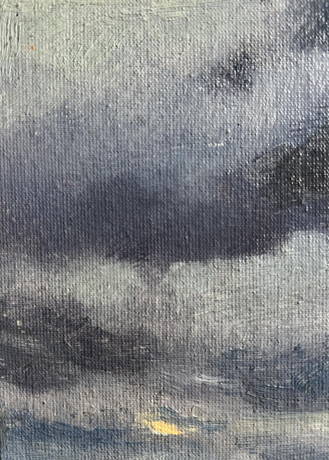 Oil painting of yellow sunset over city by Tatyana Derdey with swirling gray clouds