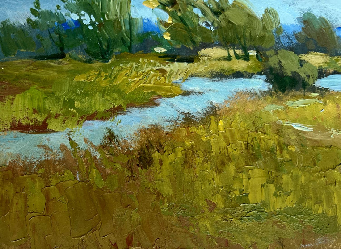 Impasto oil painting by Yuriy Suprunchuk: lush trees, blue stream, golden grasses