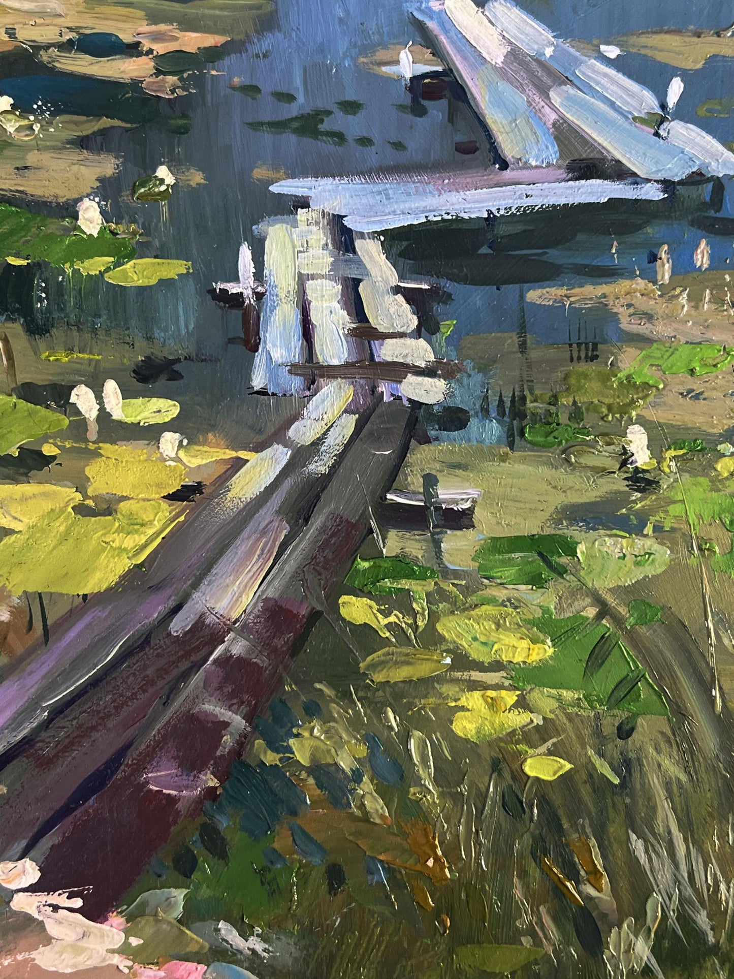 Rustic wooden bridge in Yuriy Suprunchuk oil painting Boats on the river bank
