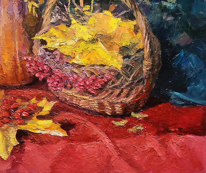 Oil painting by Boris Serdyuk: basket of yellow leaves, pink berries on red surface