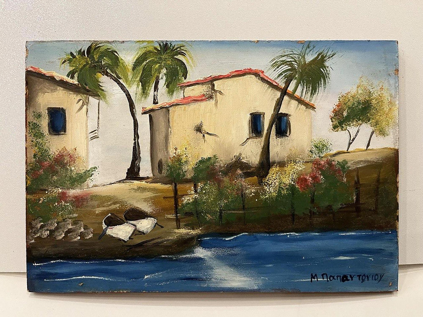 Oil painting of houses by the sea, coastal scene with stucco homes and palms